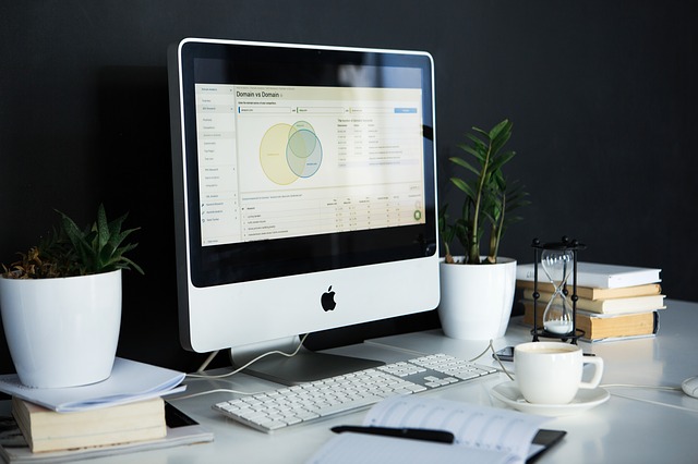 image of a desktop showing a computer and keyboard